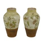 A pair of late 19th/early 20th century Doulton Burslem vases, of baluster form, with faux