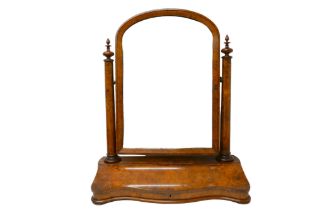 A walnut dressing table mirror, 70 by 26.5 by 85.5 cm.