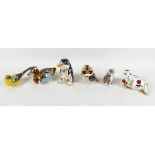A collection of Royal Crown Derby paperweights, comprising seal, platypus, mallard, owl, tabby