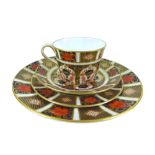 A collection of Royal Crown Derby Imari wares, including a tea cup, saucer, small plate and larger