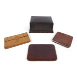 A collection of vintage leather goods, comprising an Asprey of London leather gaming wallet; two