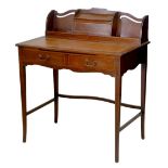 An Edwardian mahogany ladies writing desk, shaped upstand with letter rack, leather skivver, two