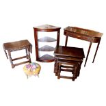 A group of furniture, comprising a reproduction Regency style mahogany side table, a nest of three