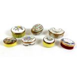 A group of seven enamel and china pill boxes, four by Bilston and Battersea Enamels, two Limoges,