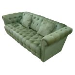 A vintage three seater Chesterfield sofa, with green velour buttoned upholstery, 186 by 89 by 67cm
