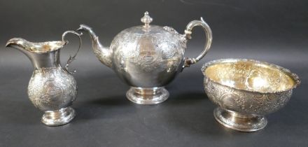A Victorian Scottish silver three piece tea service, with engraved floral decoration, presentation