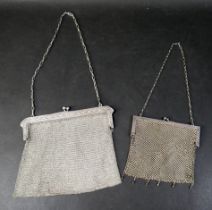 An early 20th century 800 grade silver mesh handbag, approximately 21 by 19cm, chain 60cm long,