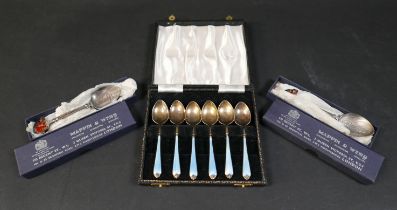 A set of six Elizabeth II silver and blue enamel spoons
