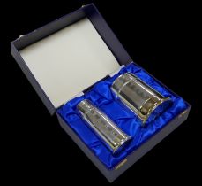An ERII cased silver cigarette holder, 9.5 by 12cm high, a cigarette table lighter, 6 13.8cm high,