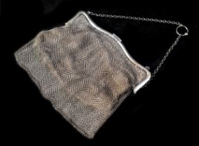 An Art Deco silver mesh evening bag, with silver chain, lined with suede, S Blanckensee & Son Ltd,