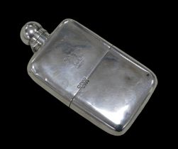 A Victorian silver hip flask, with monogram 'NI' to its hinged lid, armorial crest to main body,