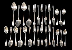 A suite of American Sterling silver cutlery, comprising four serving spoons, 21.5cm long, six