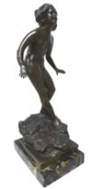 Giuseppe Renda (Italian, 1859-1939): 'Female nude descending rocks', a bronze sculpture, signed '