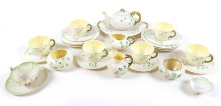 A Belleek 'Shamrock' tea service, comprising six cups and saucers, six sandwich plates, 18cm