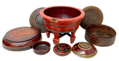 A collection of eight Chinese wooden and rattan bowls