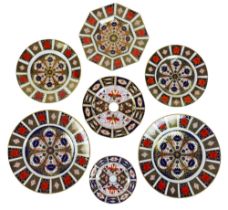 A collection of Royal Crown Derby Imari plates, including two 1128 pattern dinner plates, 27cm