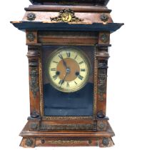 A German 19th century pine mantel clock, 28 by 12 by 42cm high.