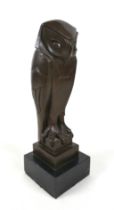 An Art Deco style bronze figure, modelled as an owl, on a black marble base, 36cm high.