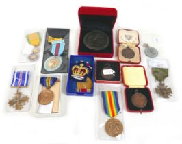 A WWl French medallion of Gratitude 68mm diameter and and assorted medals, sporting medallions,