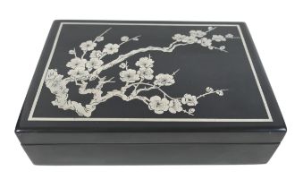 A Japanese silver inlaid black lacquer box with Cherry blossom decoration 27cm by 19cm by 7cm