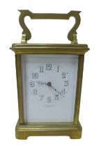 A small brass carriage clock by JAS Ritchie & Son of Edinburgh, with Arabic numeral dial, with
