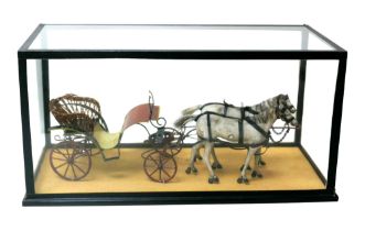 A 19th century scratch built model of carriage pulled by two horses, with real hair to mane and