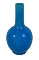 A Chinese porcelain turquoise glazed tianqiuping shaped vase, circa 1960, decorated with incised