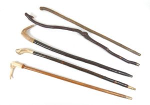 A group of five assorted wooden walking sticks, three with bone /antler handles, two plain wood. (5)