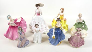 A group of lady figurines, comprising a Royal Doulton 'Elaine', HN3307; a Royal Worcester 'The