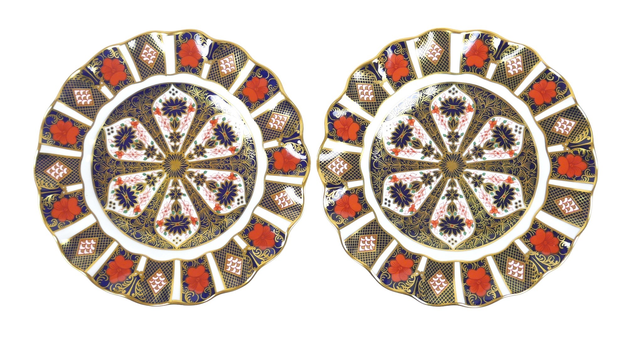 Two Royal Crown Derby cabinet plates, Imari 1128 pattern, 21.5cm, together with two Royal Crown