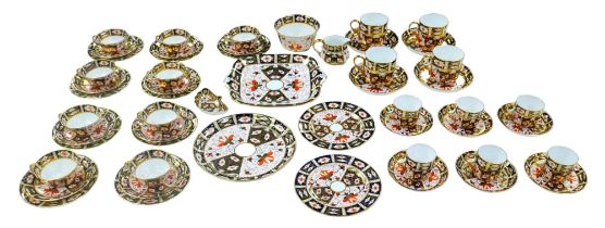 A collection of fifty-four pieces of Royal Crown Derby Imari pattern tea and coffee wares,