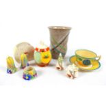A collection of Clarice Cliff, including a Daffodil shaped preserve pot in the pattern 'Nasturtium',
