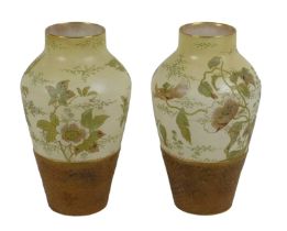 A pair of late 19th/early 20th century Doulton Burslem vases, of baluster form, with faux