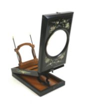 An Edwardian table top magnifier viewer, ebonised case with white floral painted decoration, 27 by