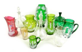 A good collection of eleven pieces of Mary Gregory and similar glass. The tallest vase stands at