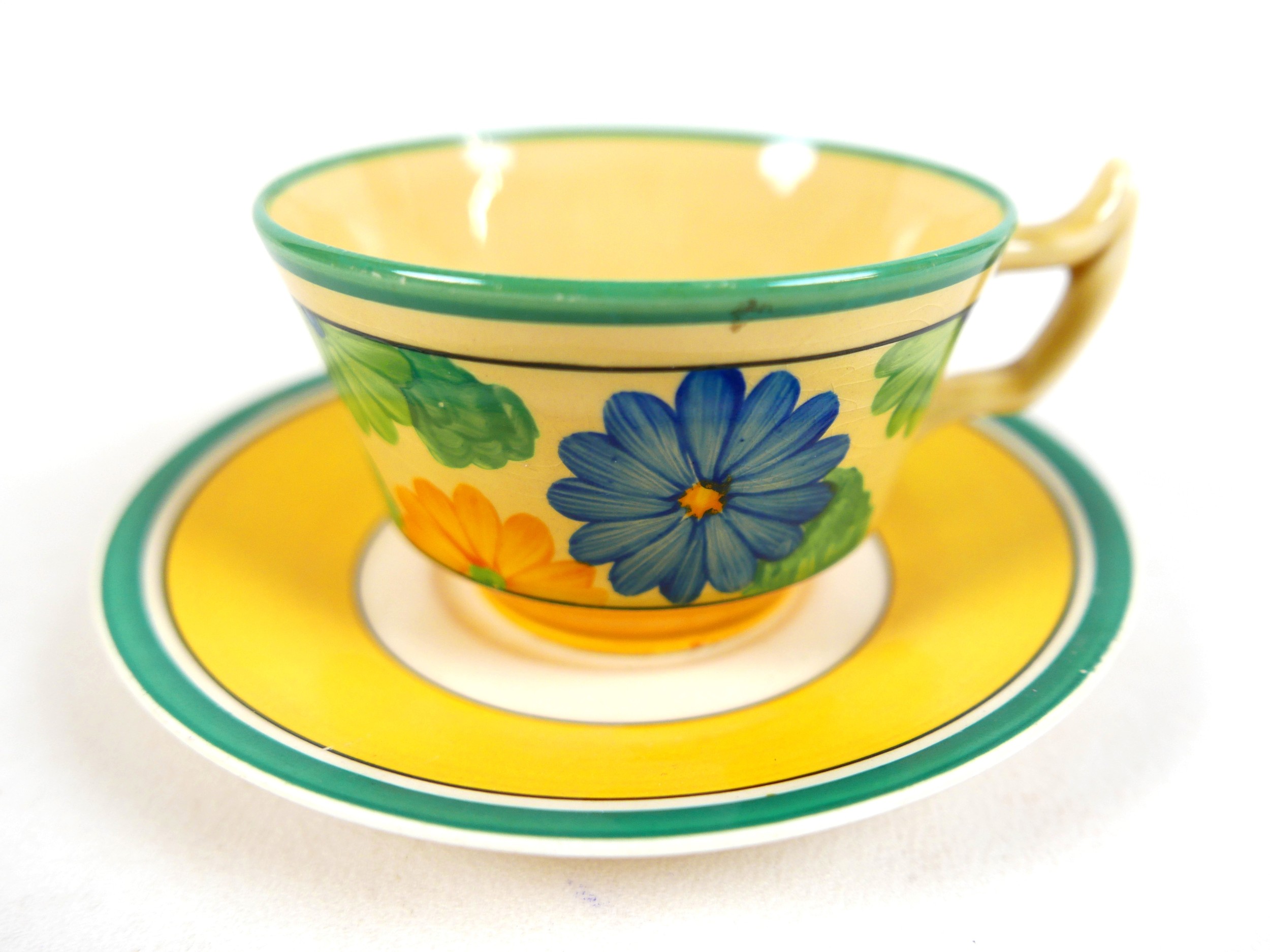 A collection of Clarice Cliff, including a Daffodil shaped preserve pot in the pattern 'Nasturtium', - Image 5 of 9