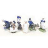 A collection of Royal Copenhagen figurines, comprising, model numbers 779, 1314, 2181, 404, 772,