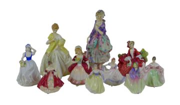 A group of china figurines, including an early Royal Doulton figure, modelled as 'Phyllys',