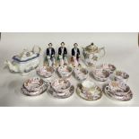 A GROUP OF DECORATIVE CERAMICS AND TEA WARES, INCLUDING TEA POTS, STAFFORDSHIRE STYLE FIGURES...