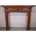 A 19TH CENTURY STYLE PINE FIRE SURROUND
