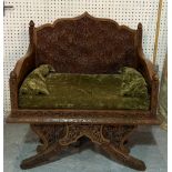 AN EASTERN CARVED HARDWOOD SQUARE BACK THRONE CHAIR