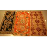 A GROUP OF THREE CHINESE RUGS (3)