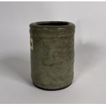 A CHINESE CELADON GLAZED CYLINDRICAL BRUSH POT