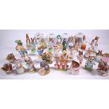BEATRIX POTTER, A QUANTITY OF ASSORTED CERAMIC ITEMS INCLUDING FIGURES, MONEY BOXES AND SUNDRY