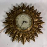 SMITHS ELECTRIC, A MODERN GOLD PAINTED SUNBURST WALL CLOCK