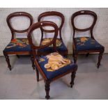 A SET OF FOUR VICTORIAN MAHOGANY FRAMED SPOONBACK DINING CHAIRS (4)