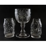 A PAIR OF ENGRAVED GLASS JUGS COMMEMORATING GEORGE III
