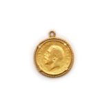 A GEORGE V SOVEREIGN MOUNTED AS A PENDANT