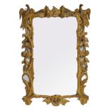 A GEORGE III GILT FRAMED HO-HO BIRD CARVED SHAPED RECTANGULAR MIRROR