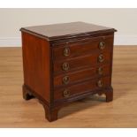 A 19TH CENTURY MAHOGANY MINIATURE FOUR DRAWER CHEST